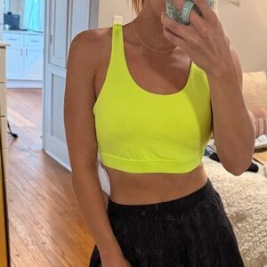 Neon Yellow Sports Bra and Black Skirt
